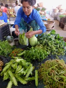 market woman with vegetables