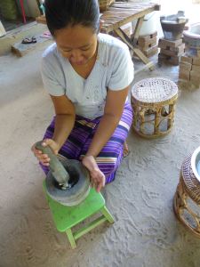 May with mortar and pestle