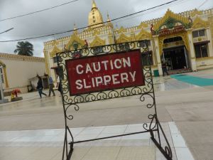 Caution slippery (sign at pagoda)