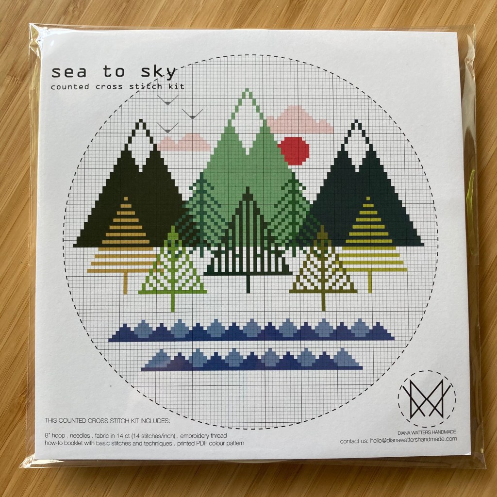 Sea to sky cross-stitch kit. Trees and ocean abstract design in a circle.